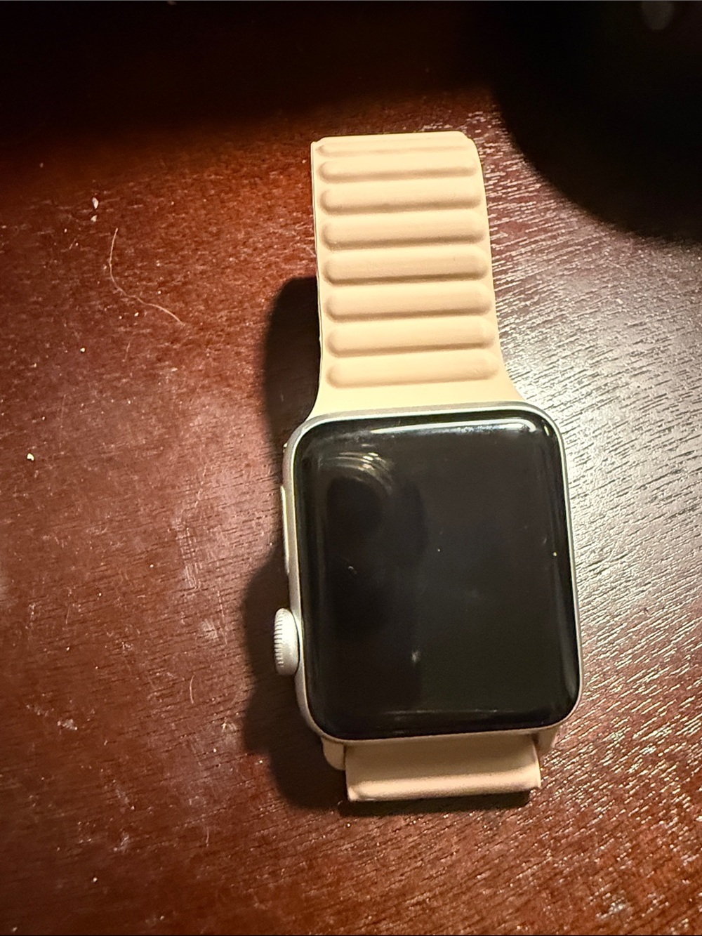 Apple Watch Series 3 with pink magnetic strap
